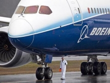 Not�cia de avan�o em acordo com a Boeing faz Embraer subir 6%